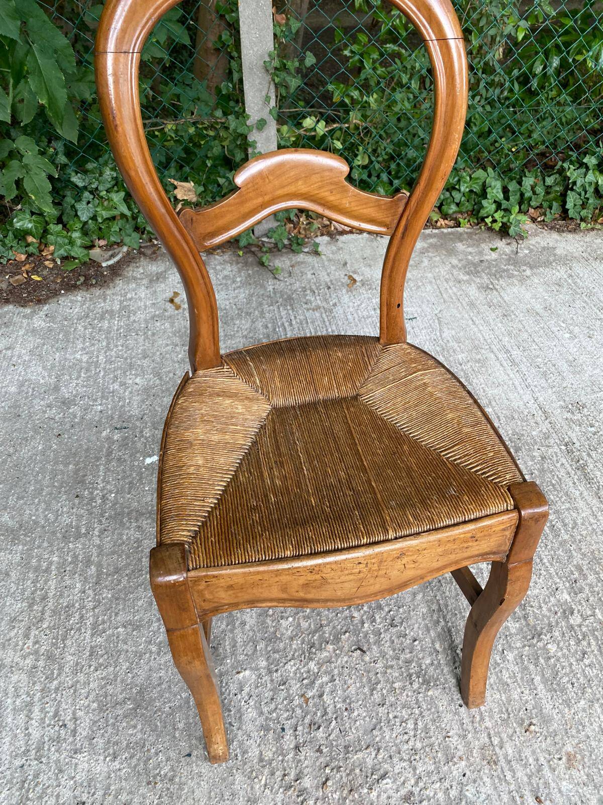 Louis Philippe solid wood and straw office chair