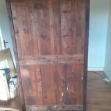 Glass cabinet in green patinated wood