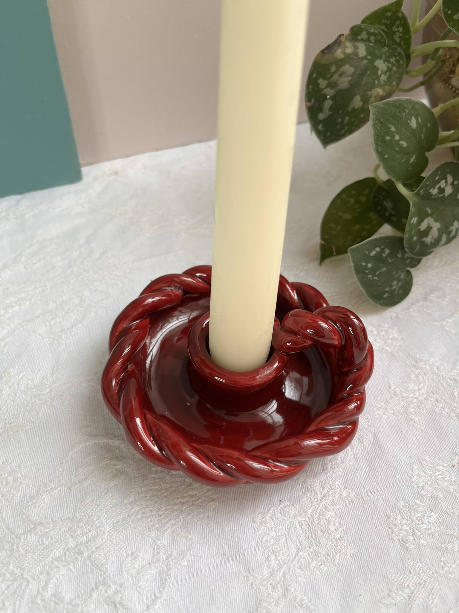 Twisted red earthenware candle holder - in the style of St Clément