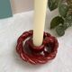 Twisted red earthenware candle holder - in the style of St Clément