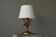 Lampe de table en métal doré motif blé, milieu du 20e siècle