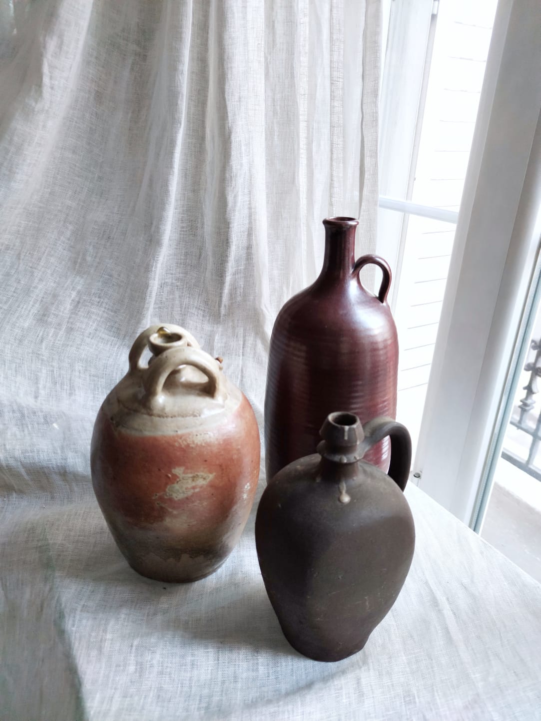 Large burgundy jar