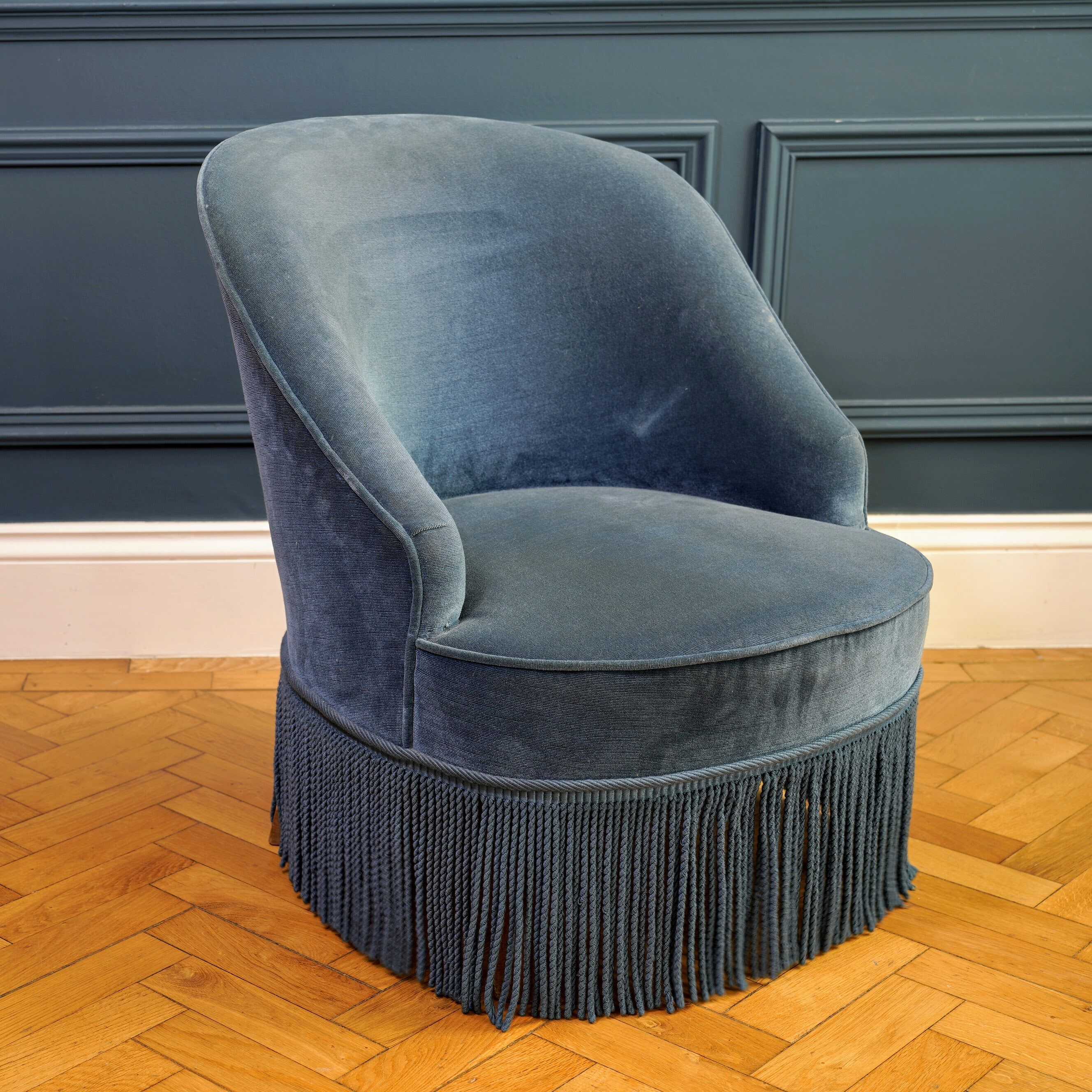 Peacock blue velvet fringed toad armchair