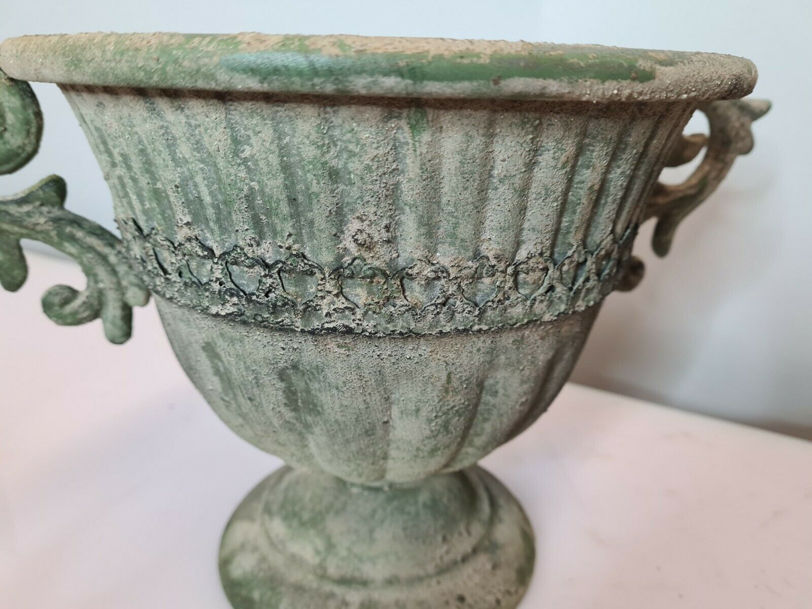 Medici in patinated iron