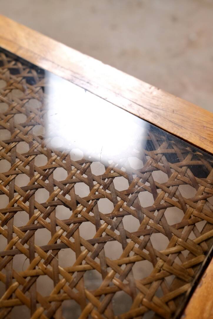 Cane and smoked glass coffee table, France, 1980.