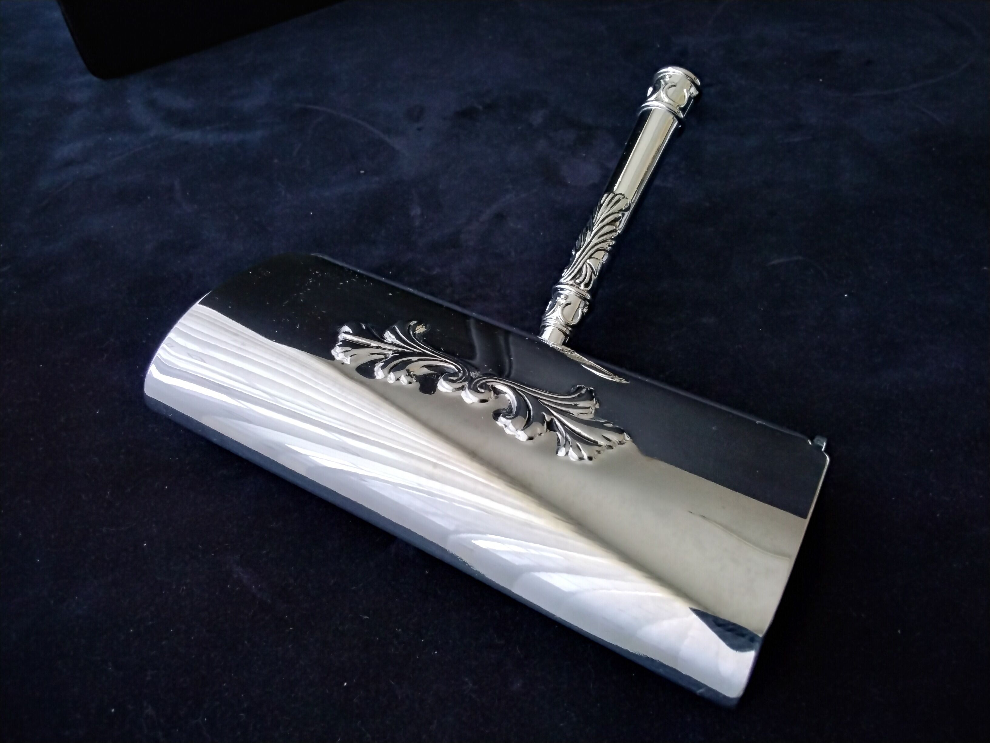 Silver metal roller crumb picker