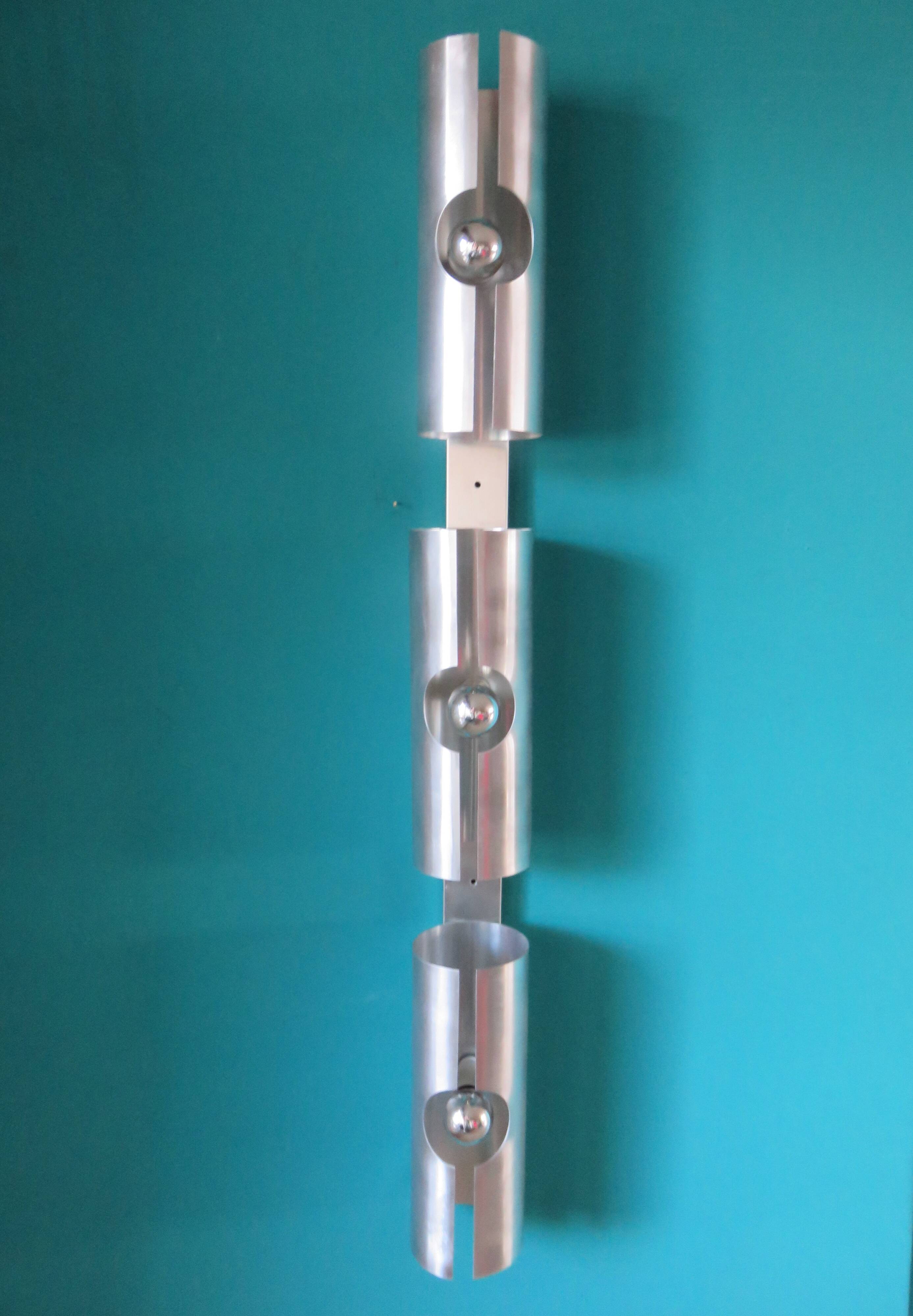 Long "SpaceAge" wall lamp in brushed aluminum. France 1970