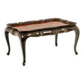 Coffee table with removable top in red and black lacquered wood. 1950s.