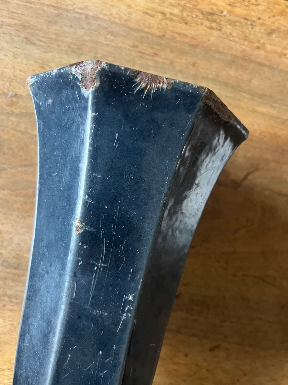 Antique enamelled cast iron vase