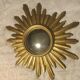 Mirror witch sun in gilded wood 57cm