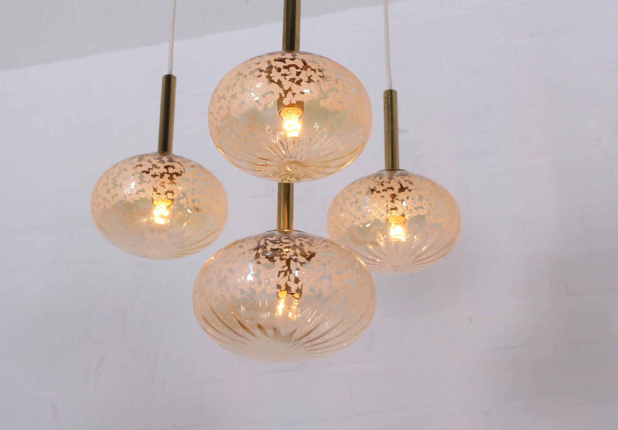 Cascade chandelier 4 globe in blown amber glass