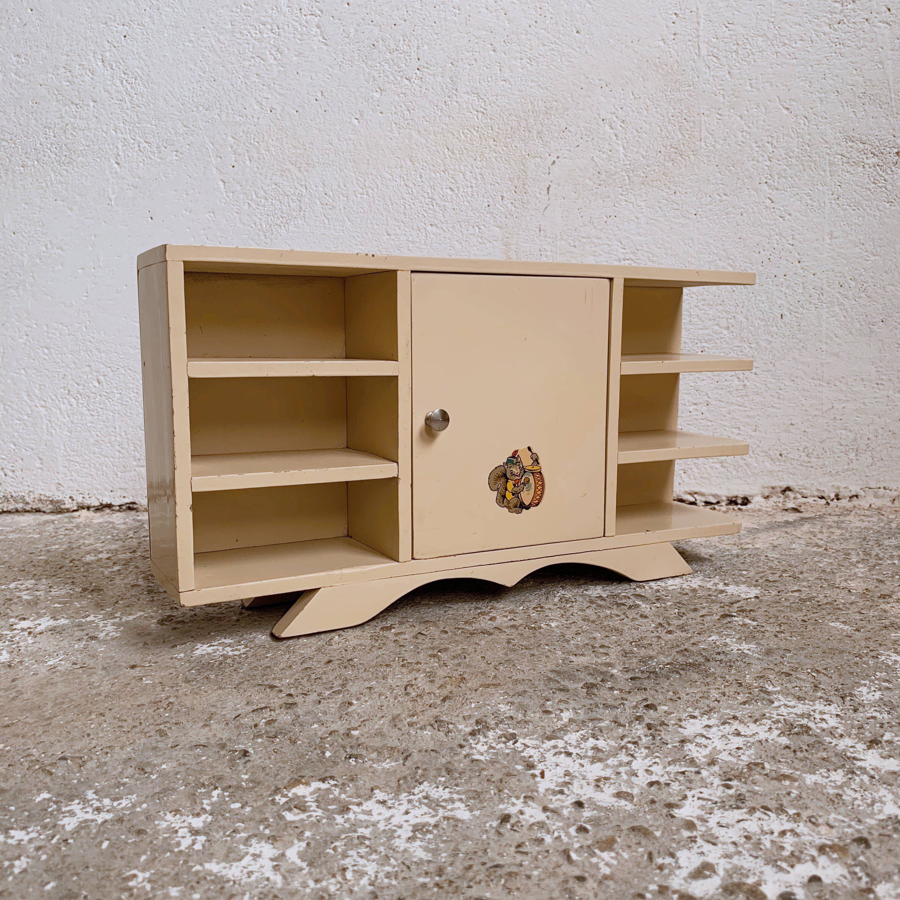 Old doll row wardrobe