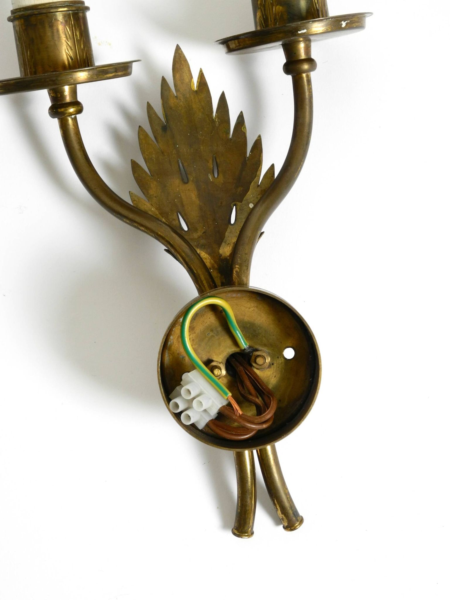 A pair of mid-century modern brass wall lamps by Vereinigte Werkstätten