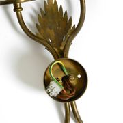 A pair of mid-century modern brass wall lamps by Vereinigte Werkstätten