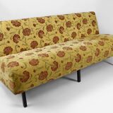 Bench with yellow and red floral fabric, France, circa 1960