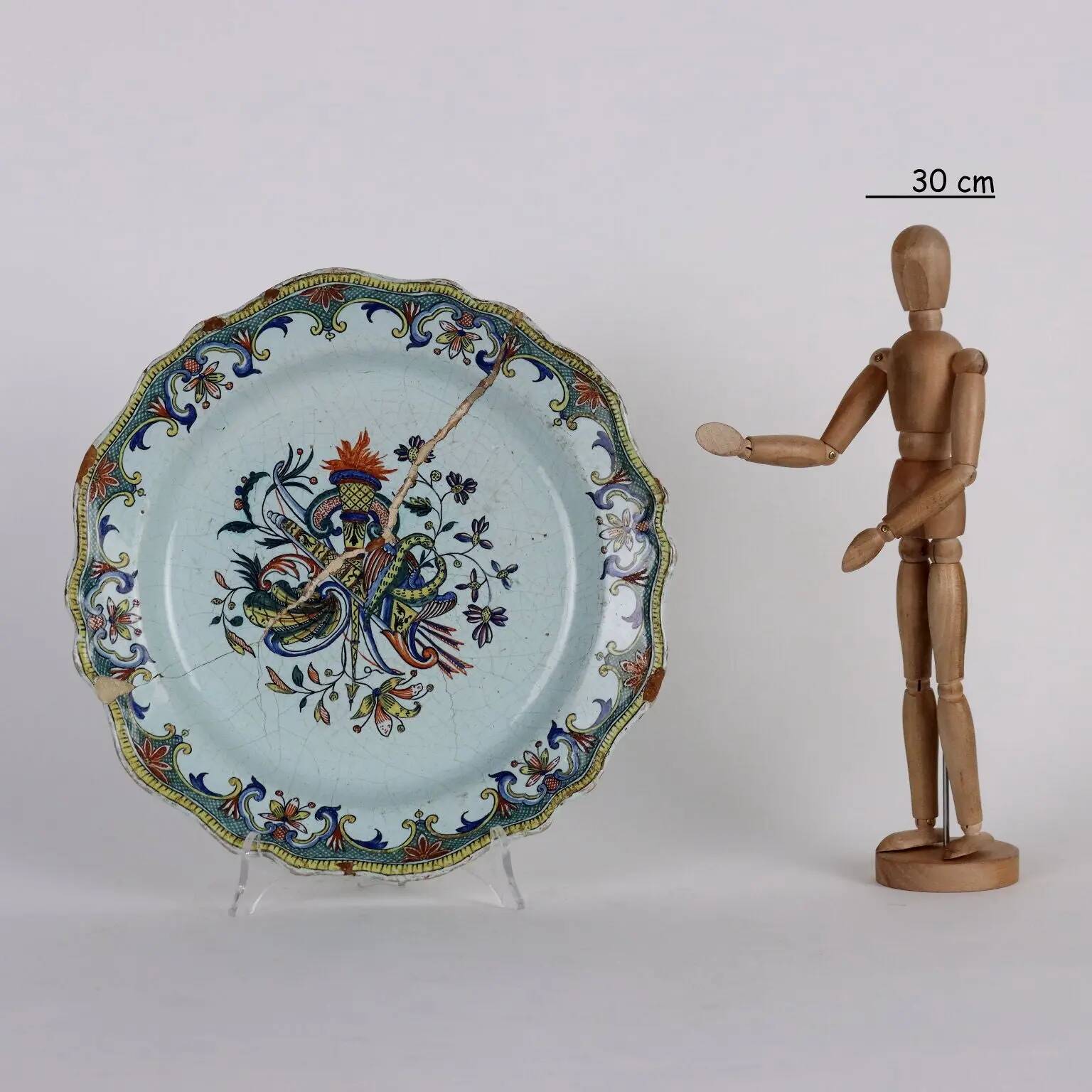 Antique plate in Rouen faience, France, mid-19th century