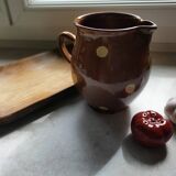 Stoneware pitcher.