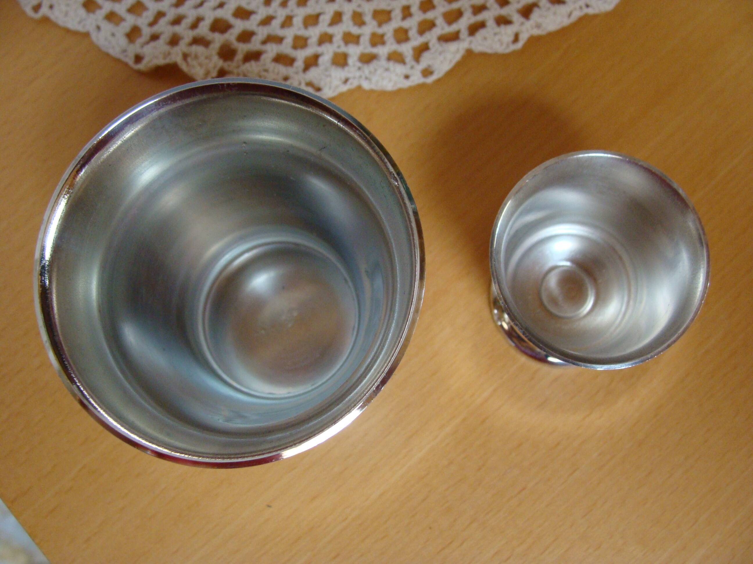 Timbale and egg cup set in silver.