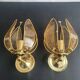 Pair of vintage brass wall sconces with glass shades