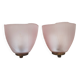Art Deco wall lights with frosted pink glass and brass.