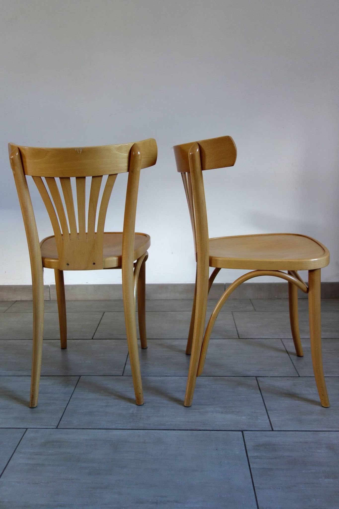Pair of Thonet-inspired bistro chairs in light beech