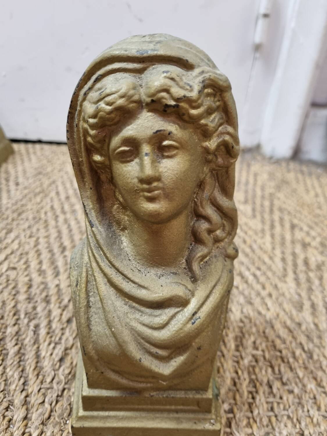 Cast iron andirons heads of women