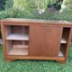 Vintage school cabinet with sliding doors