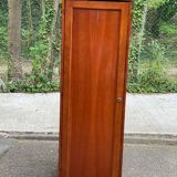 Louis Philippe wardrobe with a solid wood door.