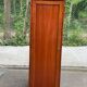 Louis Philippe wardrobe with a solid wood door.