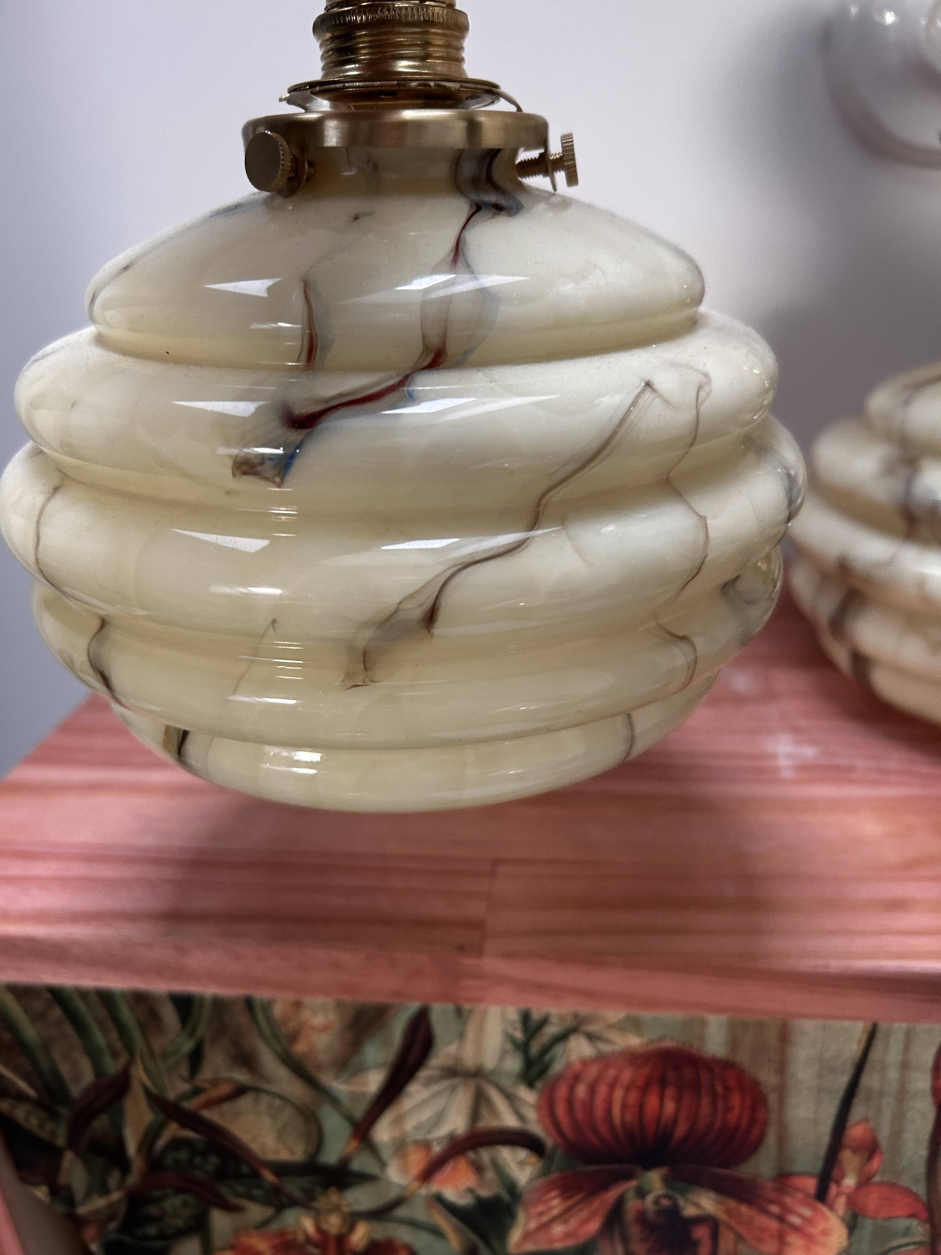 Pair of vintage marbled opaline globe wall lights