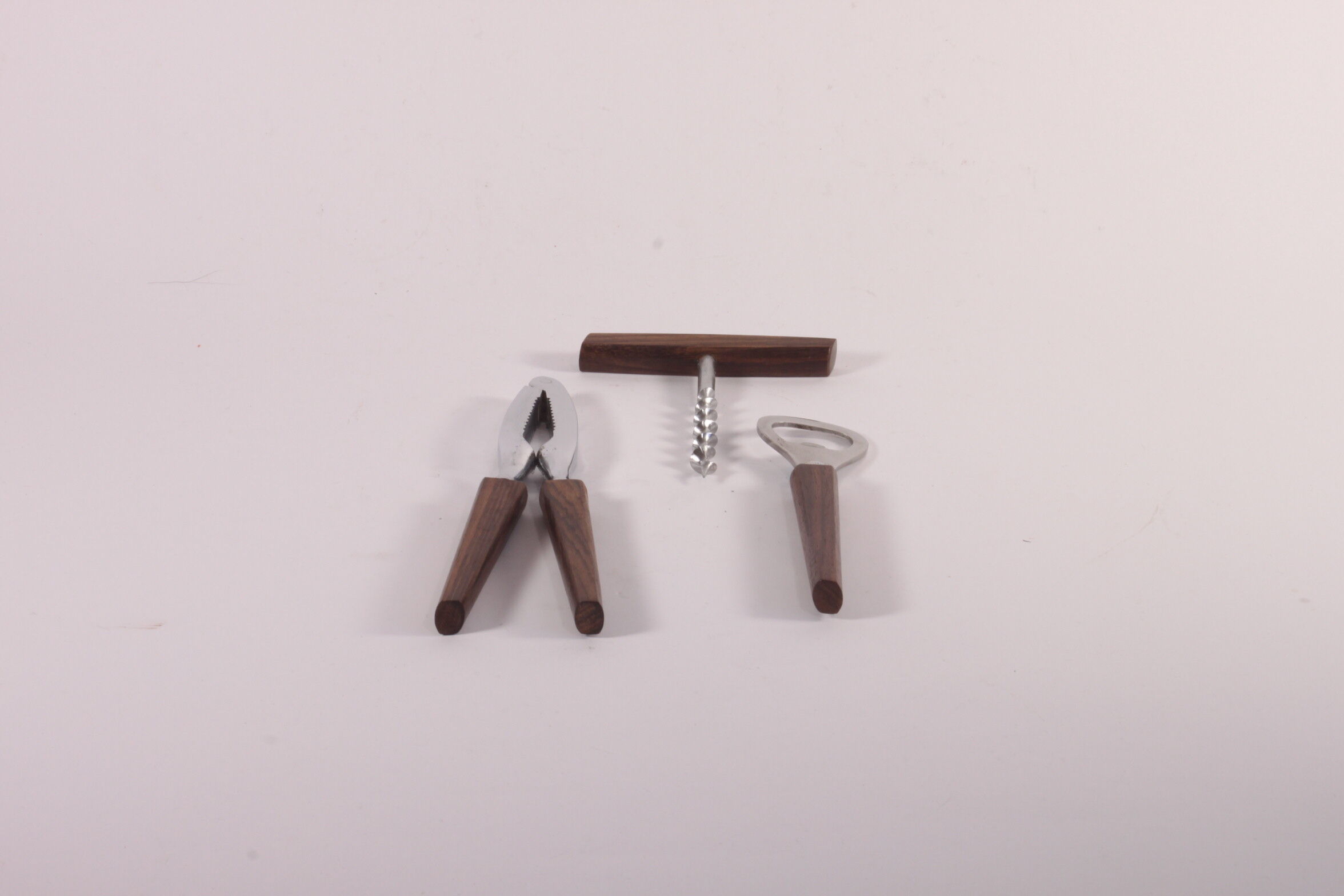 Teak wooden bottle opener, corkscrew and nutcracker set
