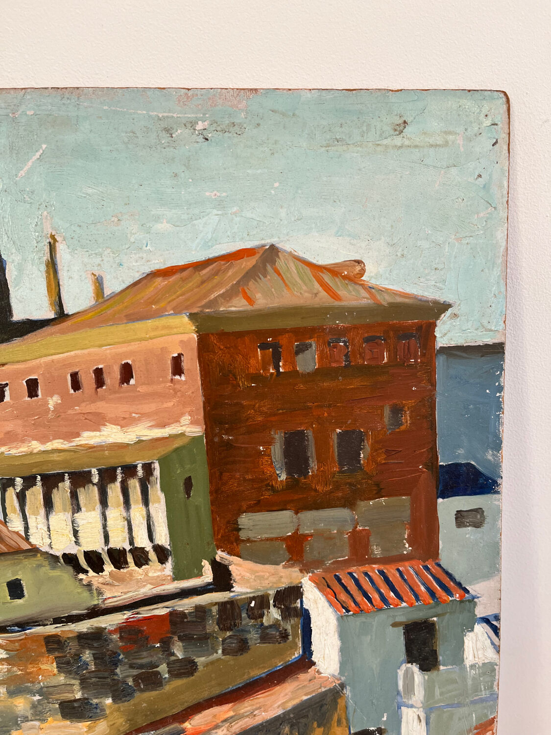 Castle in the rooftops, oil on wood panel, signed JA Dompierre.