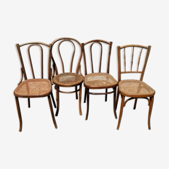 Set of four mismatched bistro chairs, 1900