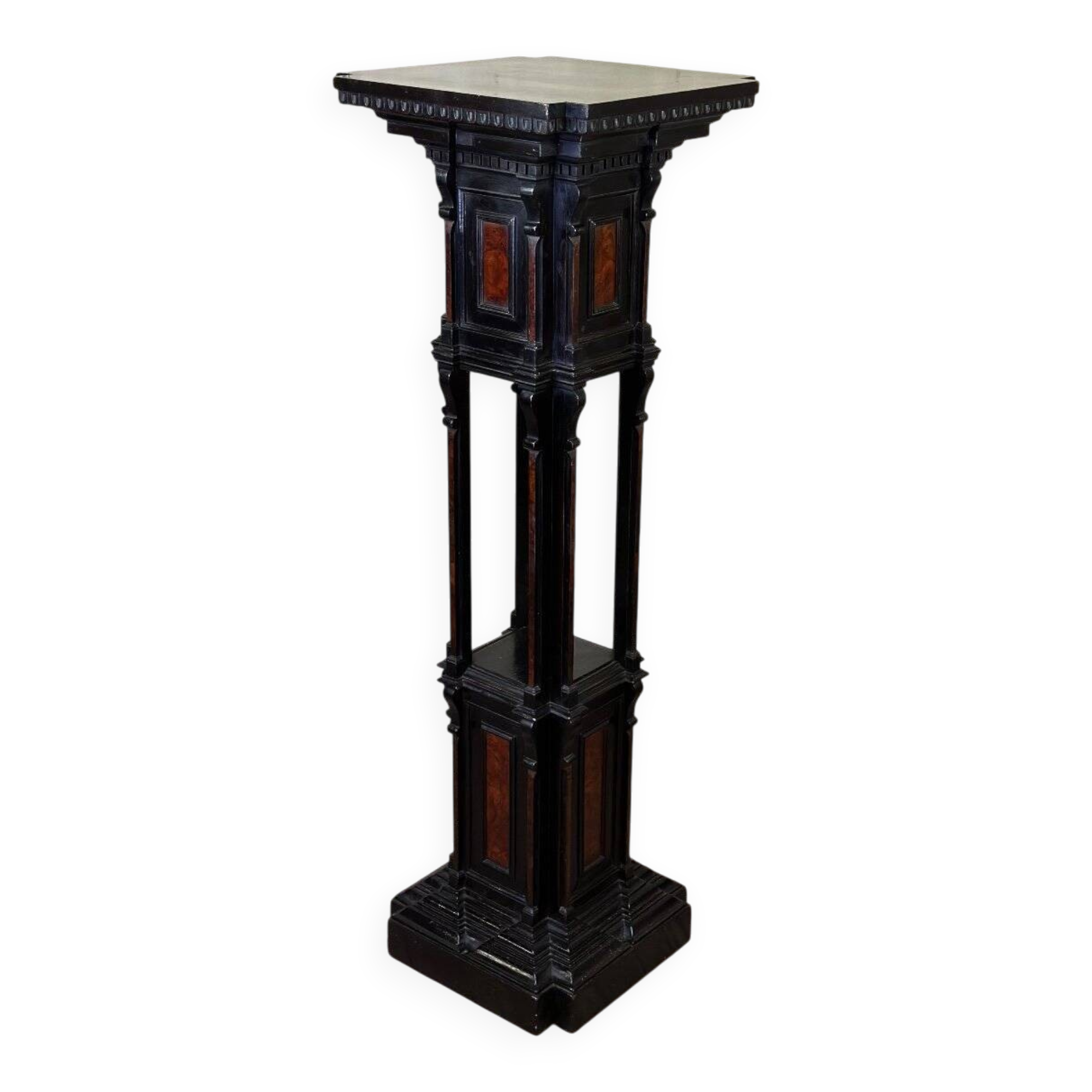 A pedestal table in blackened wood and burl veneer, superb assembly of moldings circa 1880