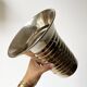 Vintage modernist striped polished aluminium vase