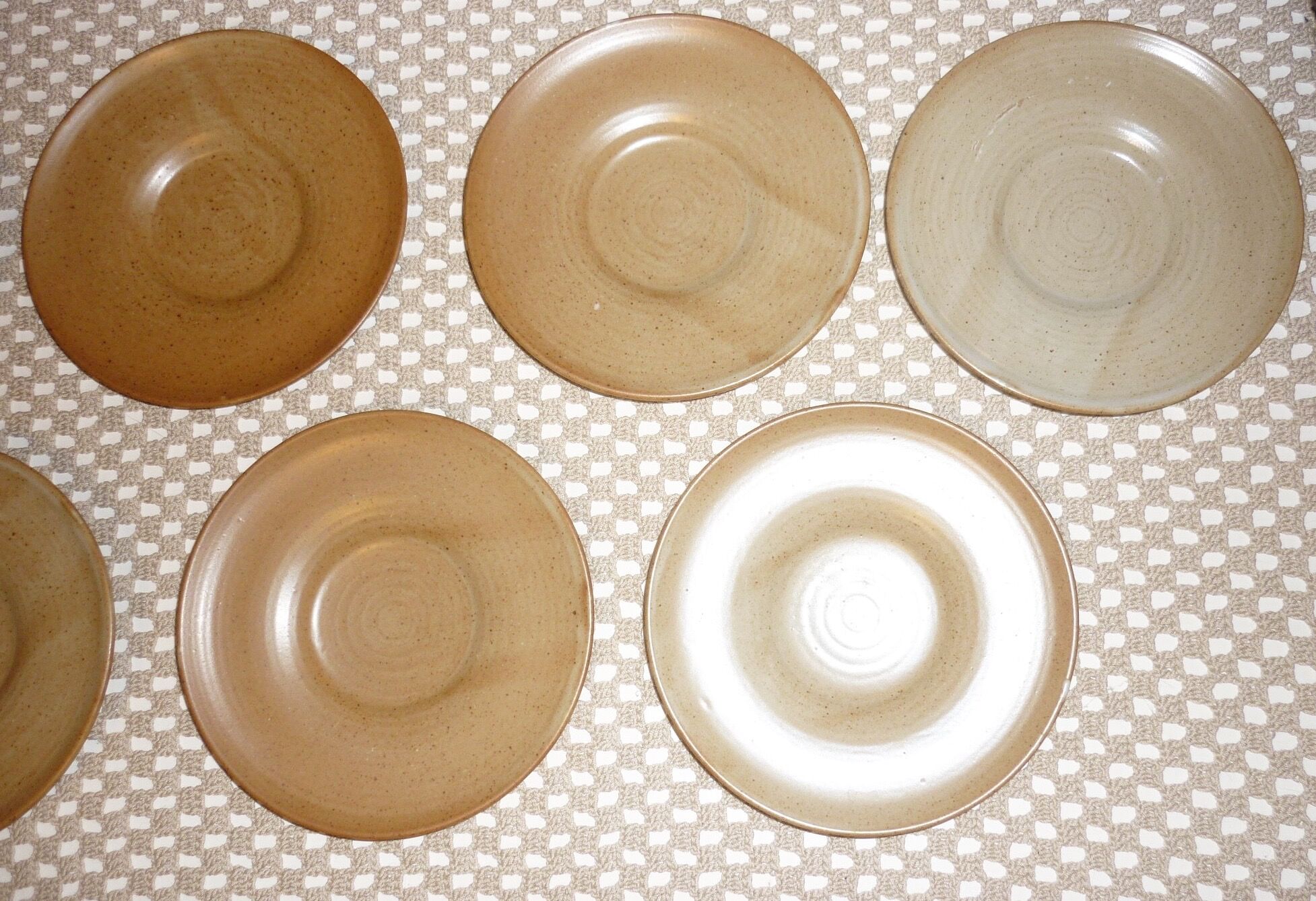 Pair of CNP Village France stoneware saucers