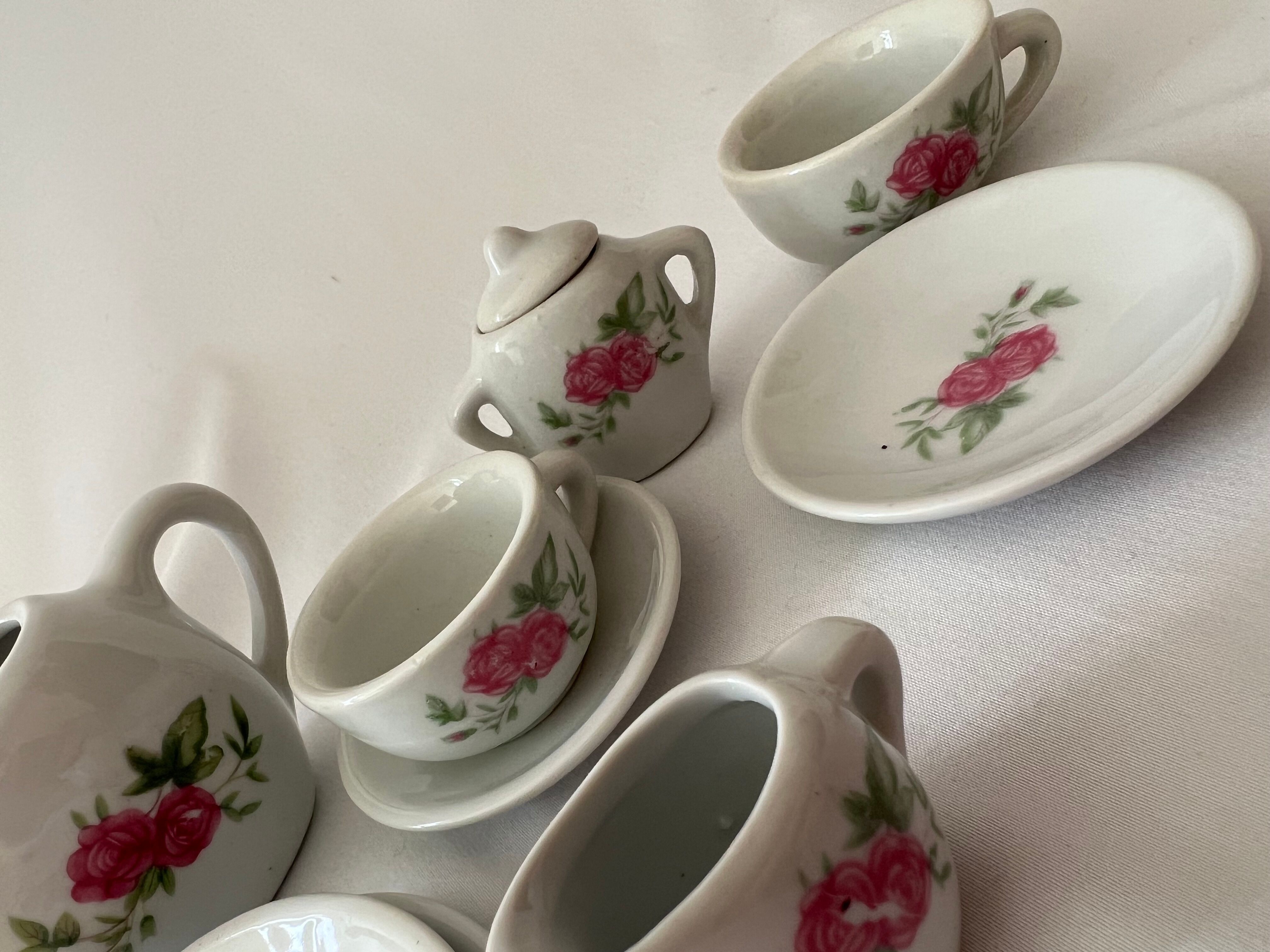 Miniature tea set with pink flowers for children