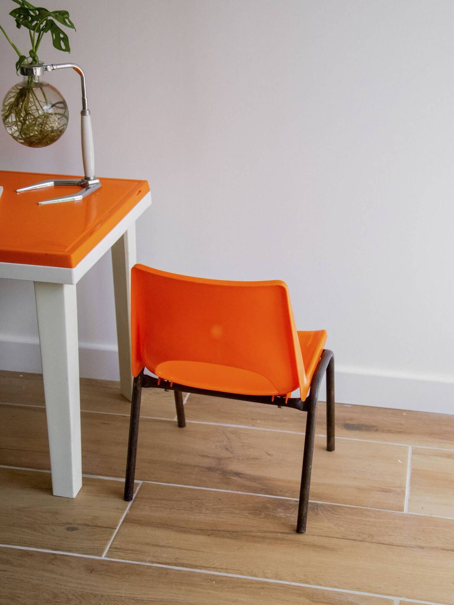 Vintage orange children's chair from the seventies.