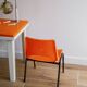 Vintage orange children's chair from the seventies.