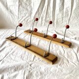 Pair of vintage wooden wall coat racks with three red ball hooks