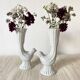 Pair of porcelain candle holders and bird vases