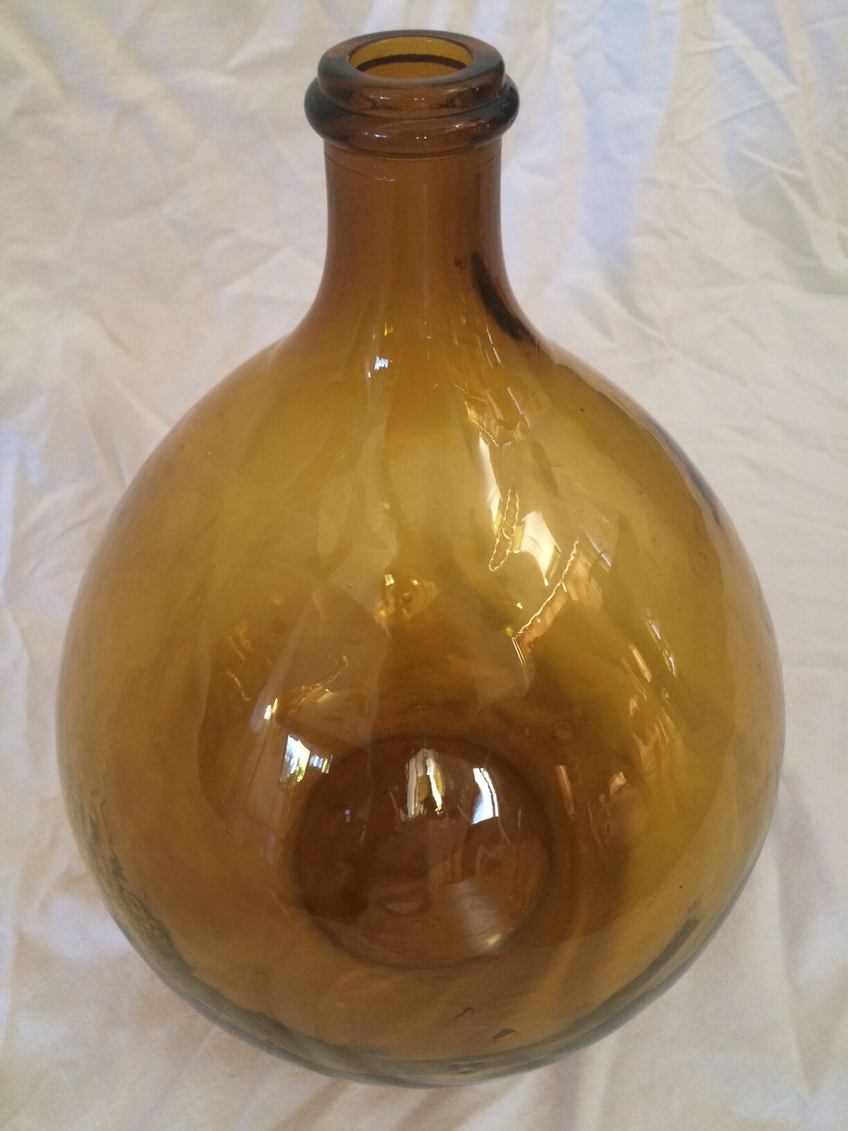 Transparent amber demijohn of 10L