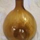 Transparent amber demijohn of 10L