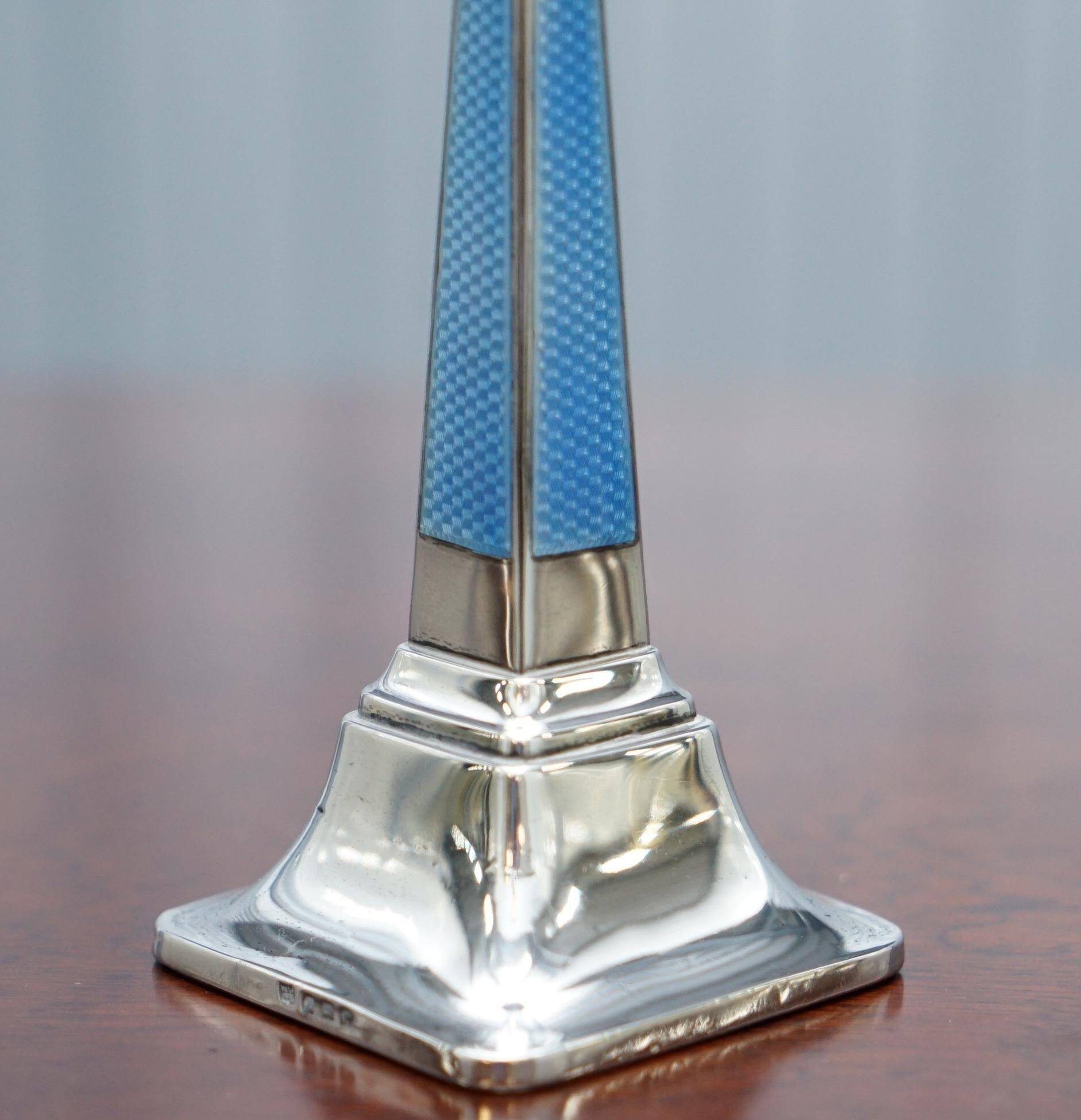 Pair of sterling silver and enamel candlesticks 1927 by Charles Green & Co.