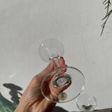 Pair of clear glass candlesticks, signed