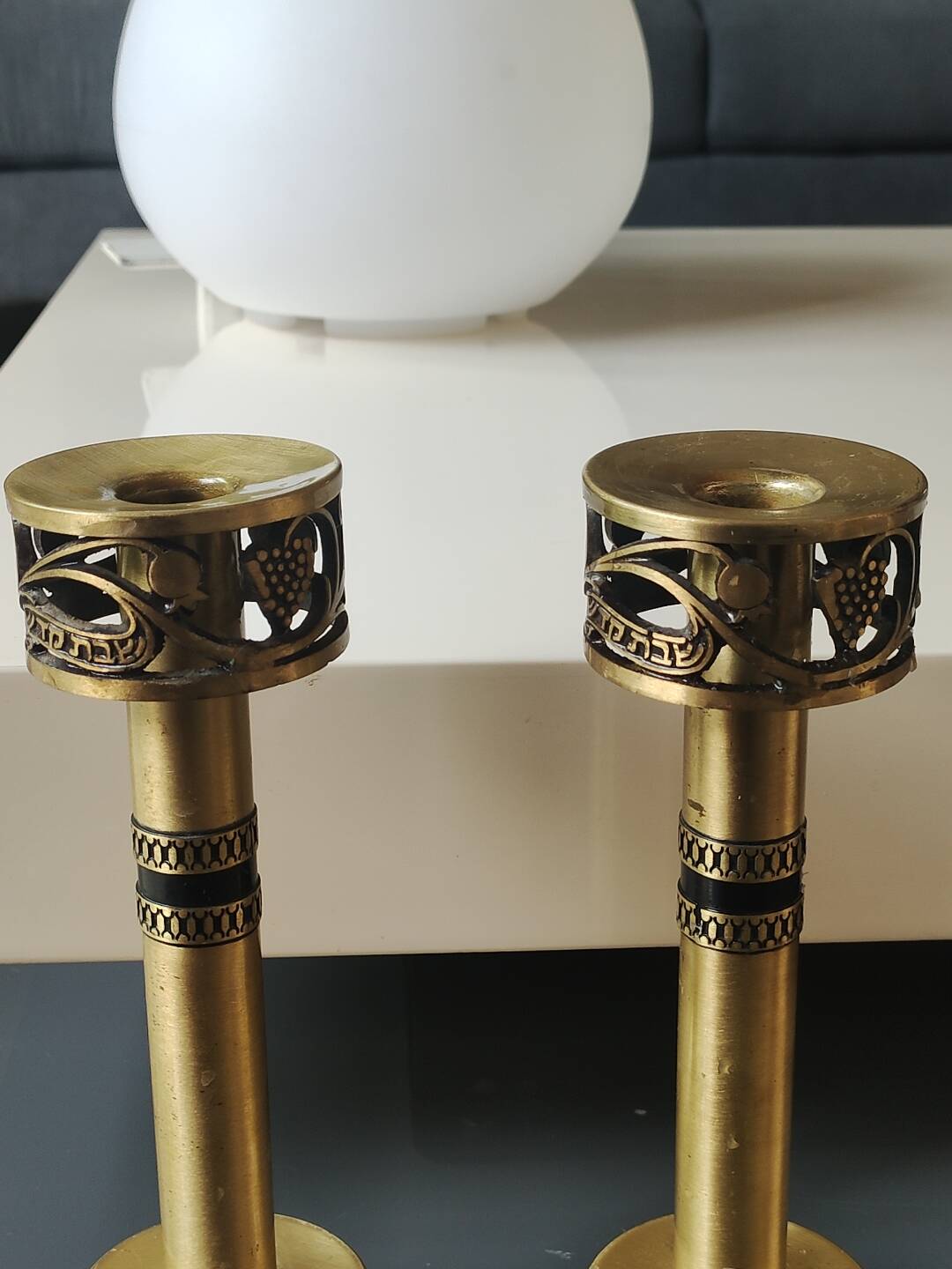 Pair of Hebrew Candlesticks. In antique gold-plated brass. Signed FFS Israel