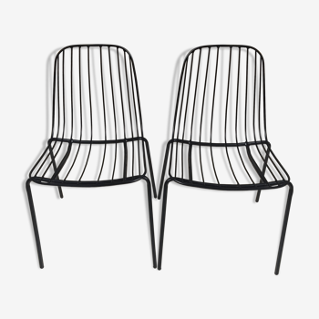 Pairs of black chairs