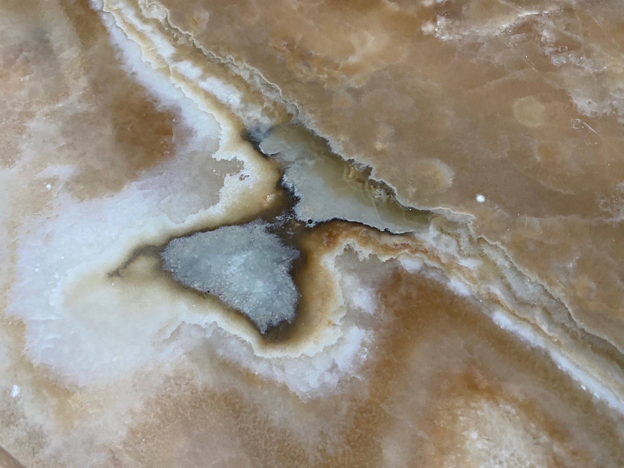 Vintage 1950s round onyx coffee table with brass base