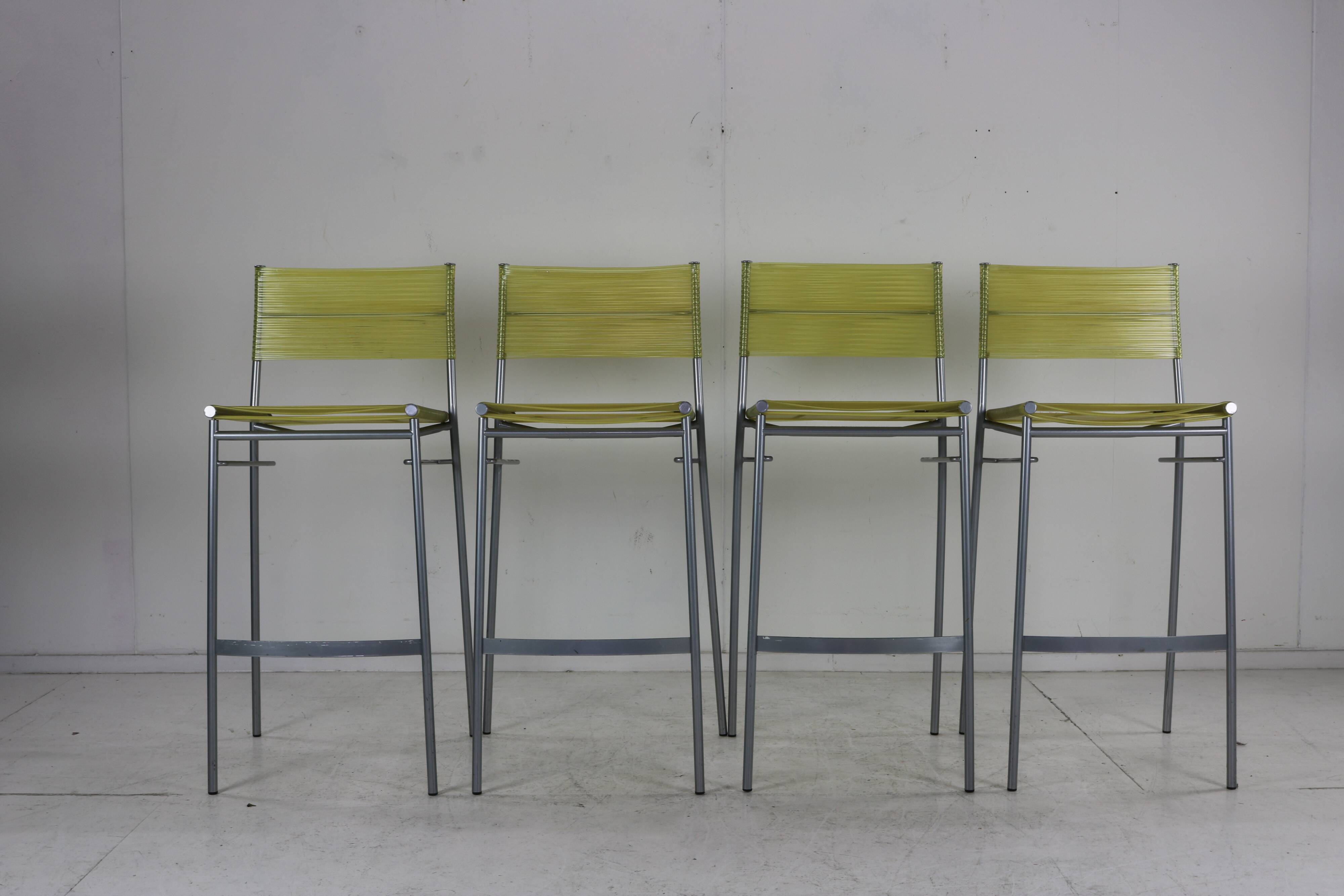 Set of four barstools by Tito Agnoli for Pierantonio Bonacina