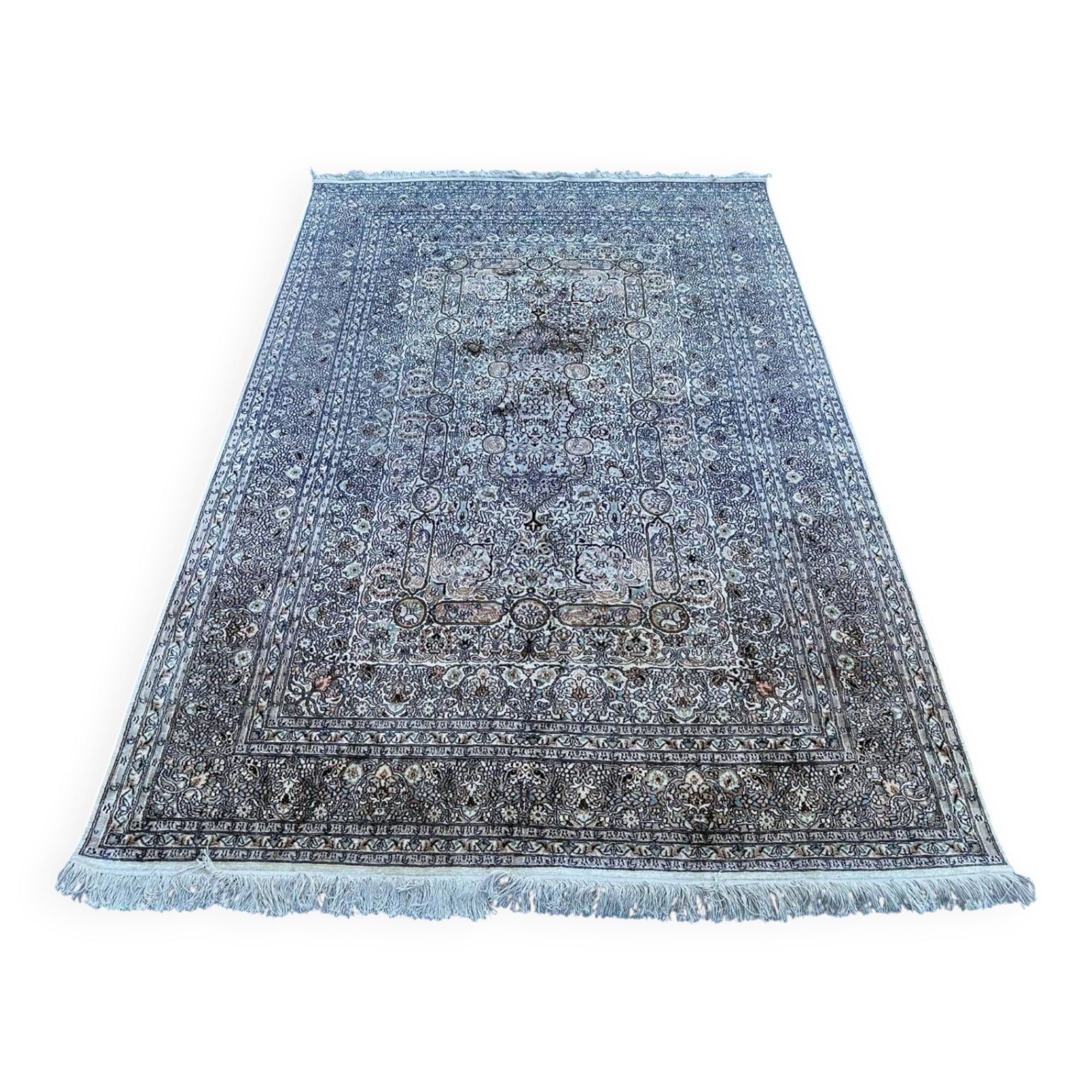 Hand-knotted Persian silk rug